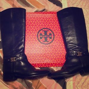Black leather Tory Burch thigh high boots.